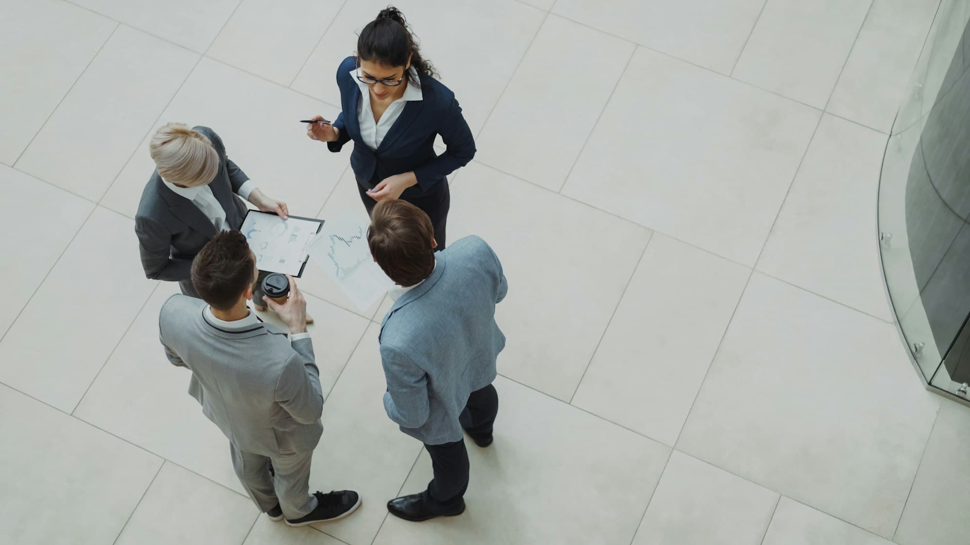 Team reviewing performance reports together in a modern office