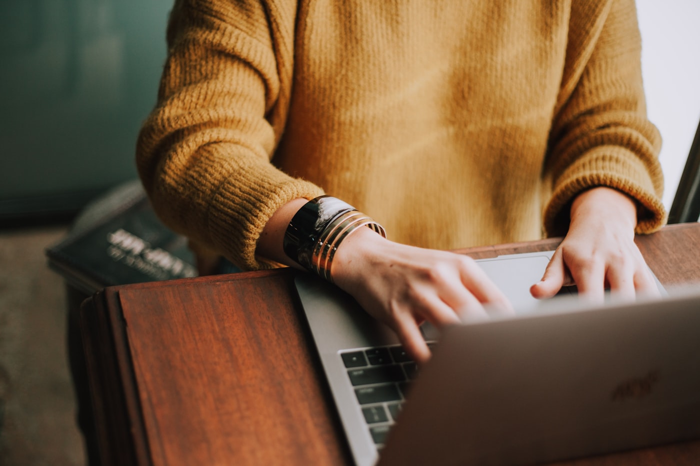 Digital marketing agency writing an email marketing campaign on a laptop