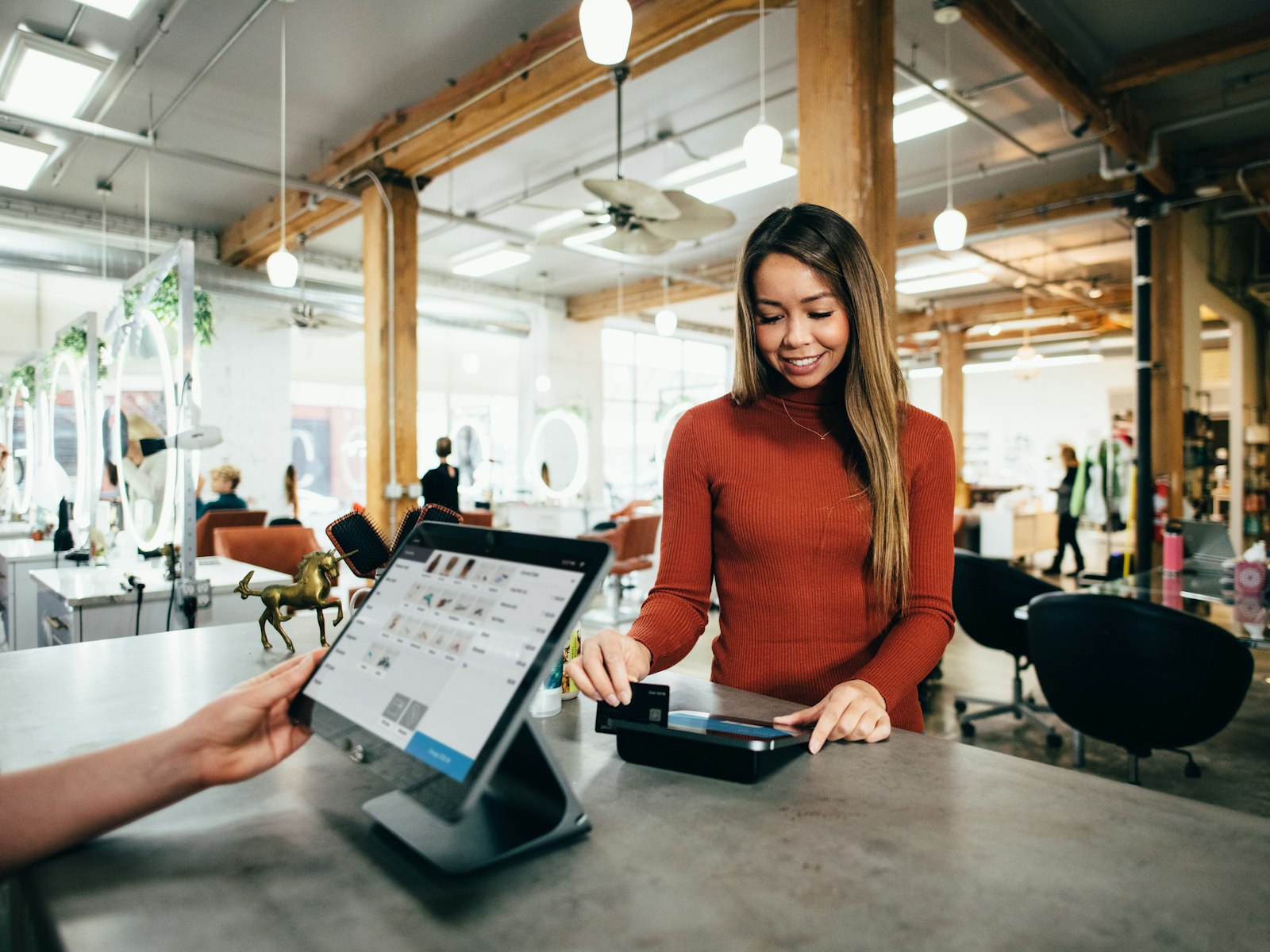 A product catalog interface displayed on a point-of-sale tablet