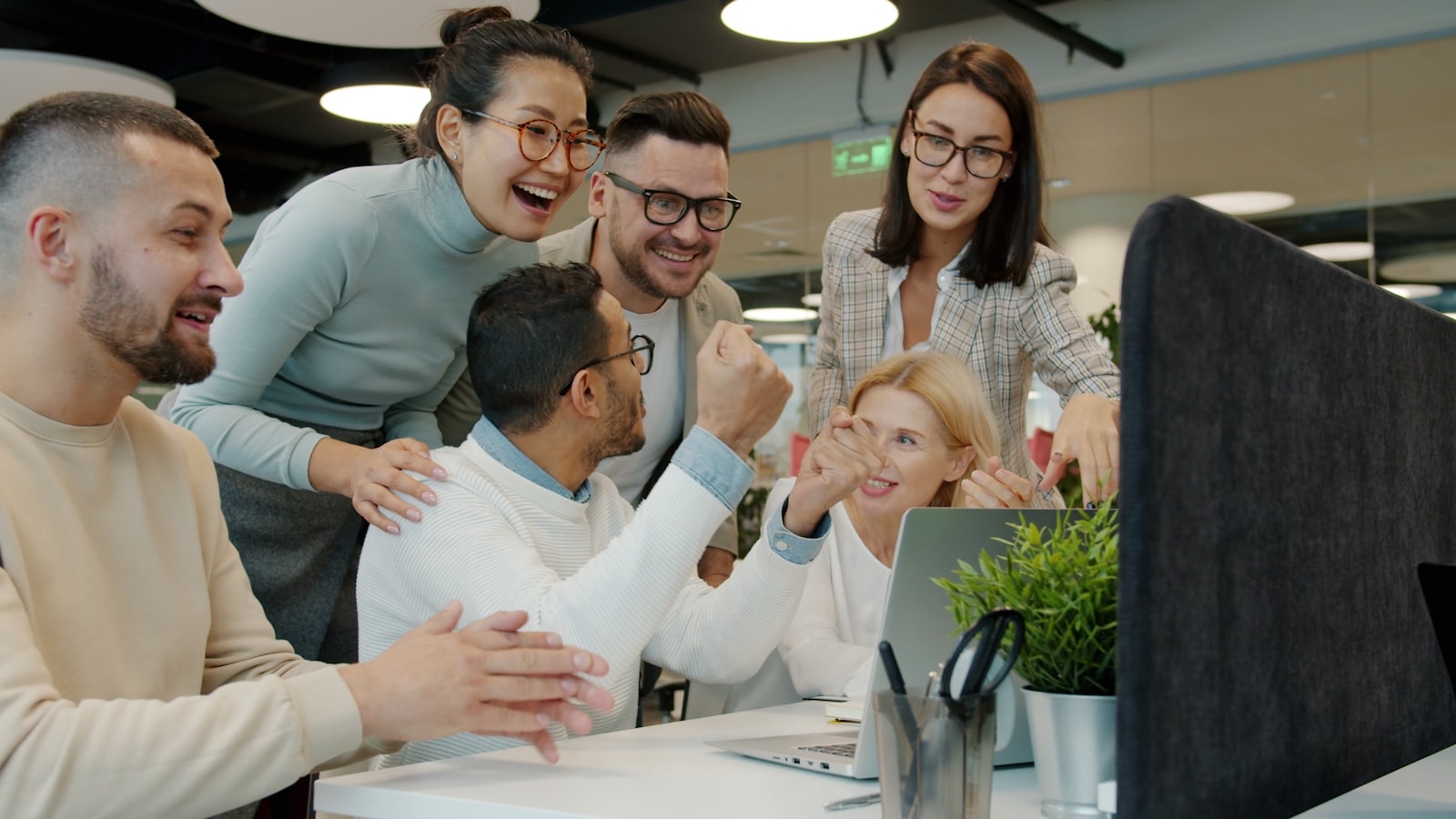 The Q3 Labs SEO and web development agency team celebrating a client win